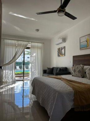 Palms 104 - 2-BR App mit Pool-Blick & Shuttle
